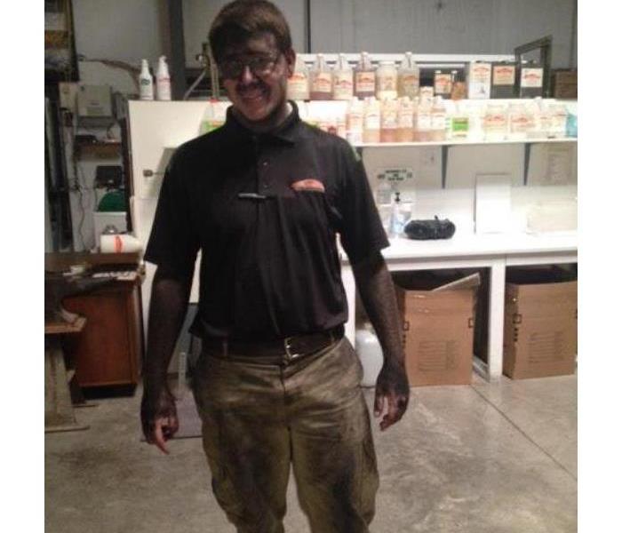Project Manager of SERVPRO covered in dirt after finishing a job.